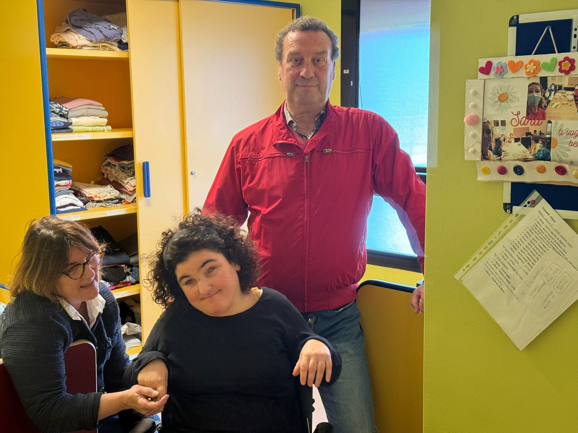 La Famiglia Orlandini in una foto al Centro Nazionale di Osimo della Lega del filo d'Oro: mamma, papà e la loro figlia ospite della "Lega"