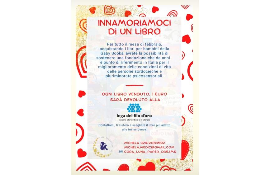 L'immagine è un volantino promozionale a tema San Valentino, con un bordo decorato da cuori rossi su uno sfondo chiaro. Il testo centrale, su un riquadro trasparente, invita a "INNAMORIAMOCI DI UN LIBRO", spiegando che per tutto febbraio l'acquisto di libri per bambini da "Gaby Books" sosterrà la "Lega del Filo d'Oro", con 1 euro per ogni libro venduto devoluto alla fondazione. Include anche i contatti di Michela per assistenza.
