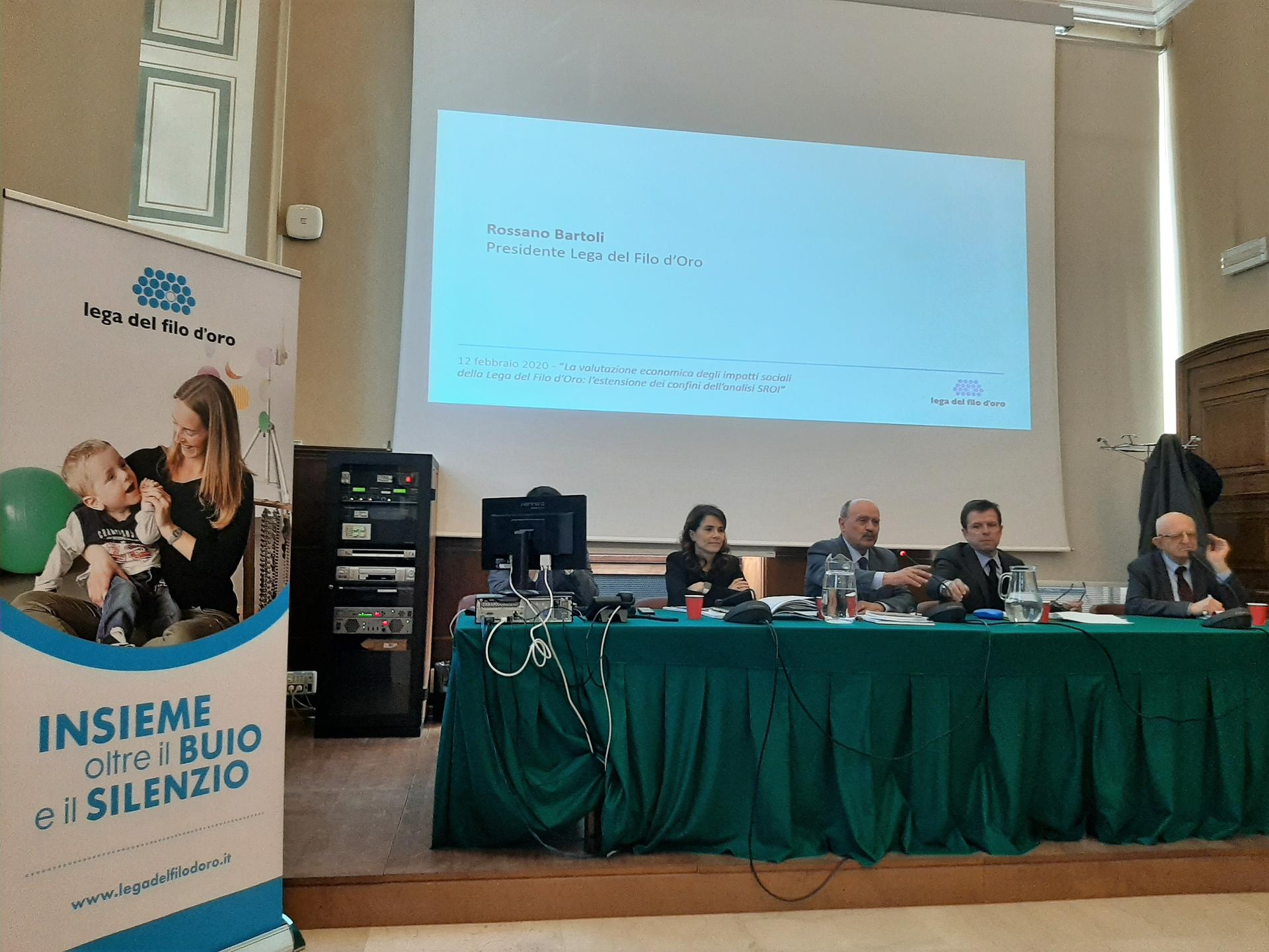 Foto del tavolo dei relatori durante la presentazione del lavoro sull'impatto sociale SROI della Lega del Filo d'Oro
