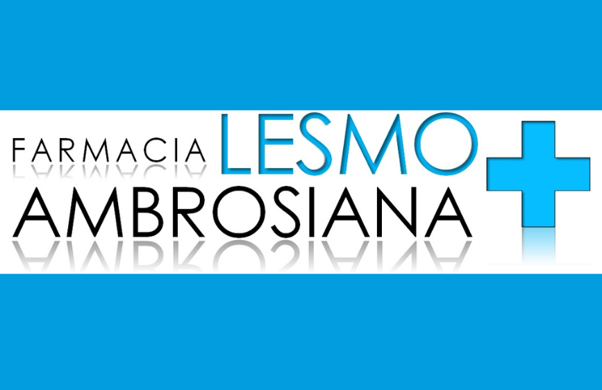 Nell'immagine è rappresentato il logo della Farmacia Ambrosiana Lesmo, caratterizzato da un design moderno e pulito. Il nome è suddiviso in due sezioni evidenziate cromaticamente: "FARMACIA AMBROSIANA" in nero e "LESMO" in azzurro, accompagnato da una grande croce azzurra che richiama il simbolo della sanità.