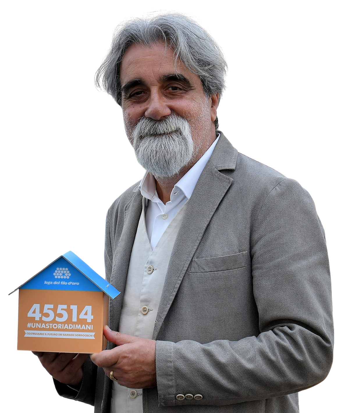 Il Maestro Beppe Vessicchio ha sostenuto la campagna unastoriadimani della Lega del Filo d'Oro e ha voluto raccontare la sua esperienza. Nella foto il maestro sostiene la casetta di carta, simbolo della campagna.