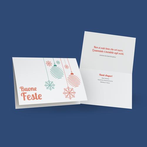 Il biglietto per augurare buone feste con raffigurate delle palline rosse e verde