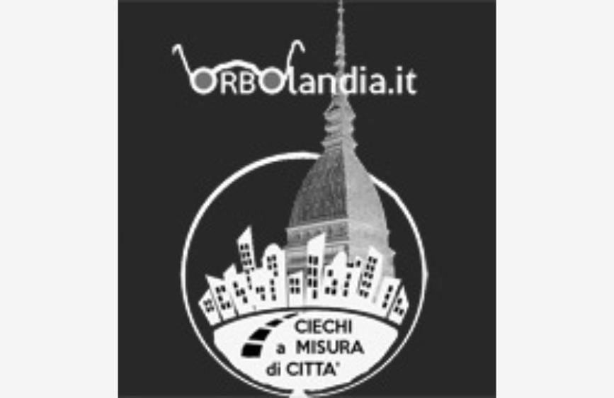 l' immagine è un logo in bianco e nero per "orblandia.it - CIECHI A MISURA DI CITTA'". Presenta una stilizzazione della Mole Antonelliana di Torino con uno skyline urbano in primo piano, il tutto racchiuso in un cerchio. Sopra la Mole, un paio di occhiali stilizzati formano il nome del sito "orblandia.it".