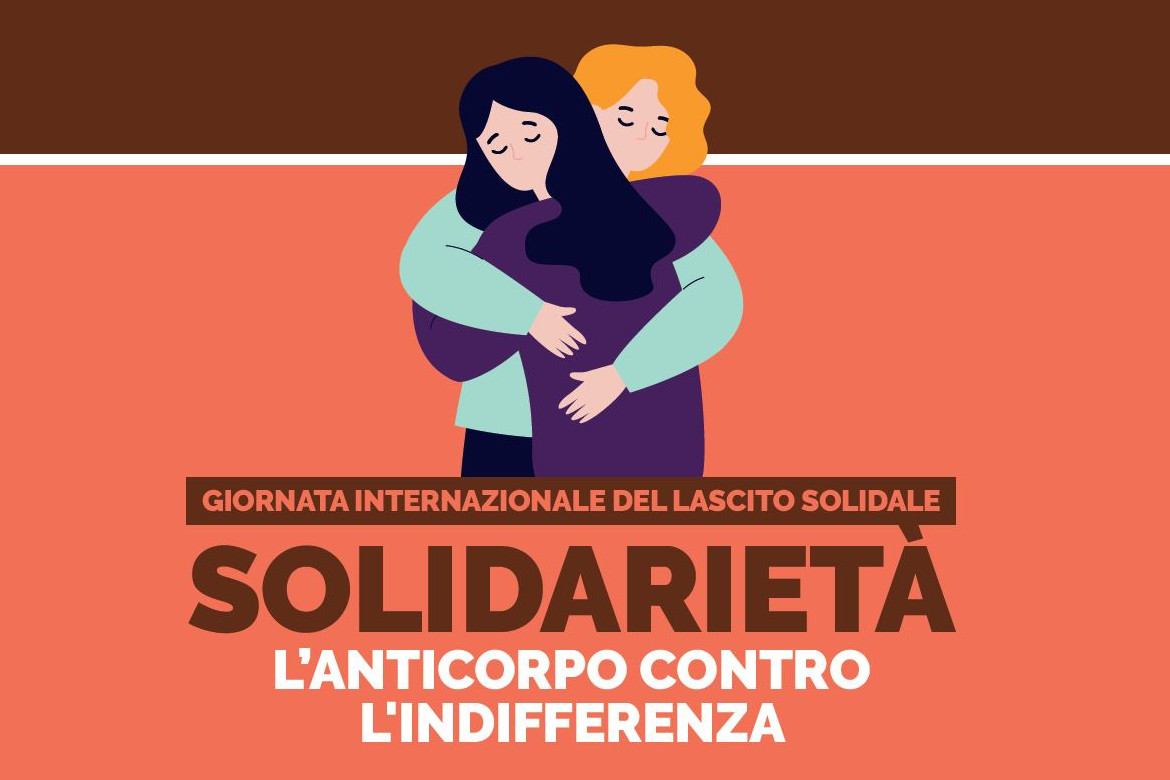 Immagine con grafica. Su sfondo rosso e marrone, sono raffigurate due donne che si abbracciano, mentre sotto c'è la scritta "Giornata Internazionale del Lascito Solidale - Solidarietà - L'anticorpo contro l'indifferenza"