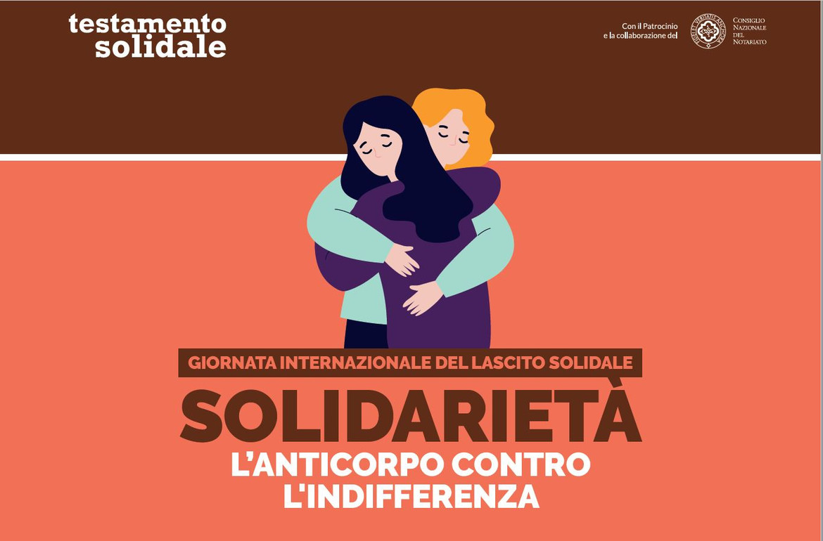 Immagine con grafica. Su sfondo rosso e marrone, sono raffigurate due donne che si abbracciano, mentre sotto c'è la scritta "Giornata Internazionale del Lascito Solidale - Solidarietà - L'anticorpo contro l'indifferenza"